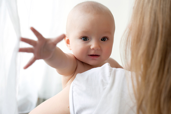 5216709553941010.jpg mom_and_baby_reaching2.jpg