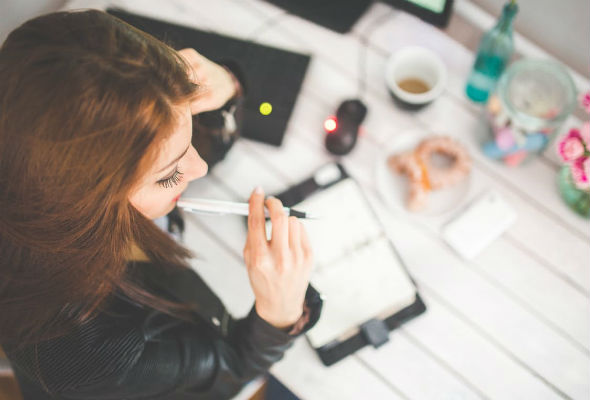 woman-hand-desk.jpg