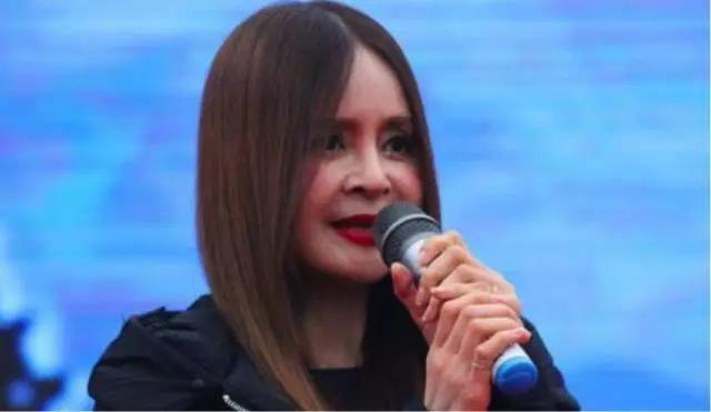 48岁的甜歌王后高胜美